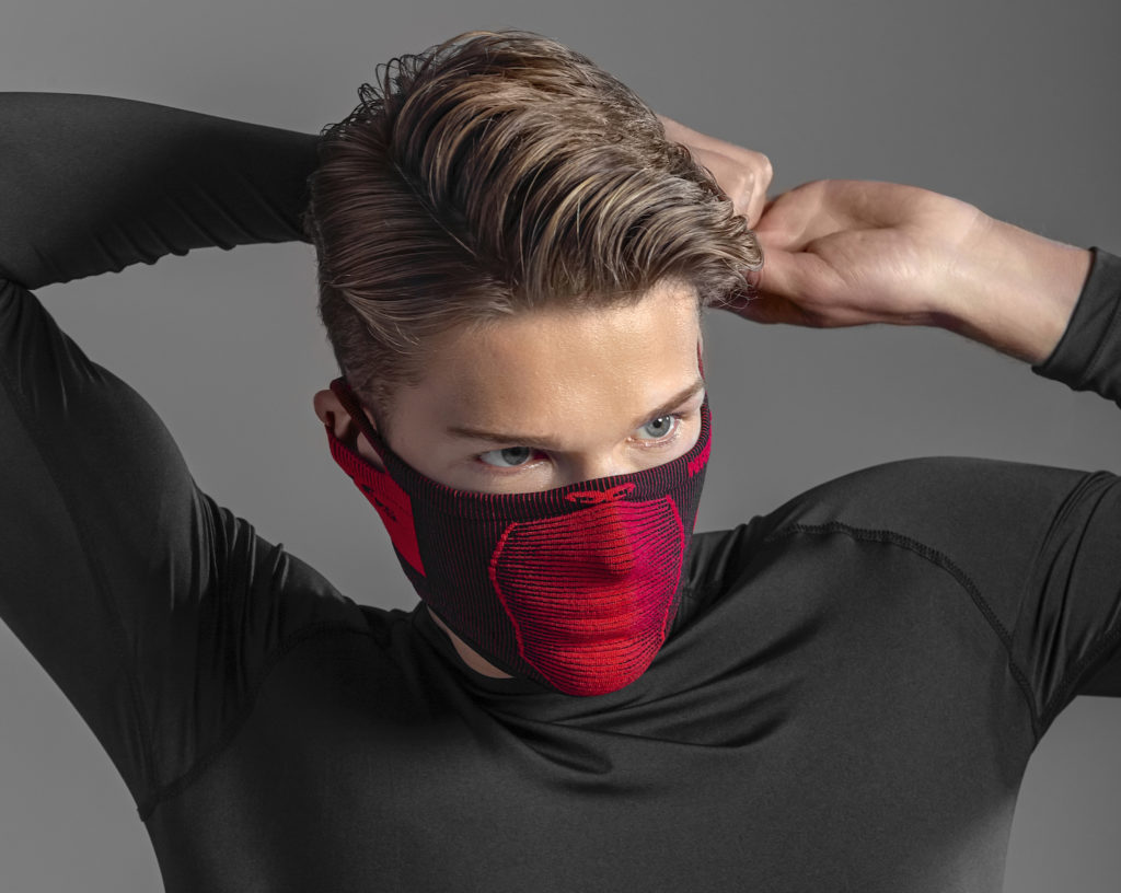 NAROO X5s - red sports mask on model for UV protection, all-weather, mesh fabric, quick-dry fabric, and ear loops 1