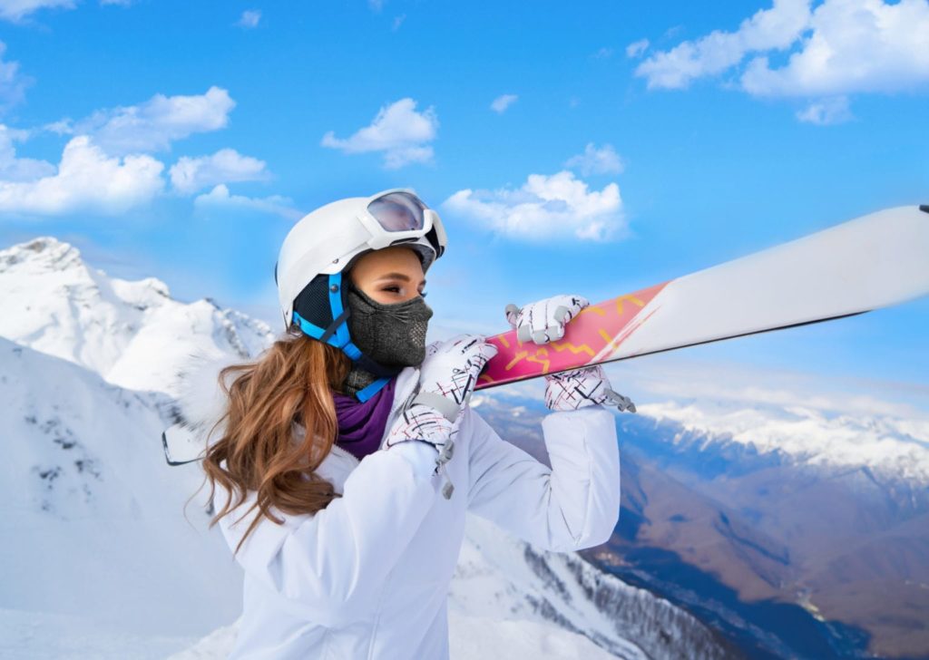 NAROO-Sports-Mask-N9H-for-skiing in the winter for warmth. woman with skis