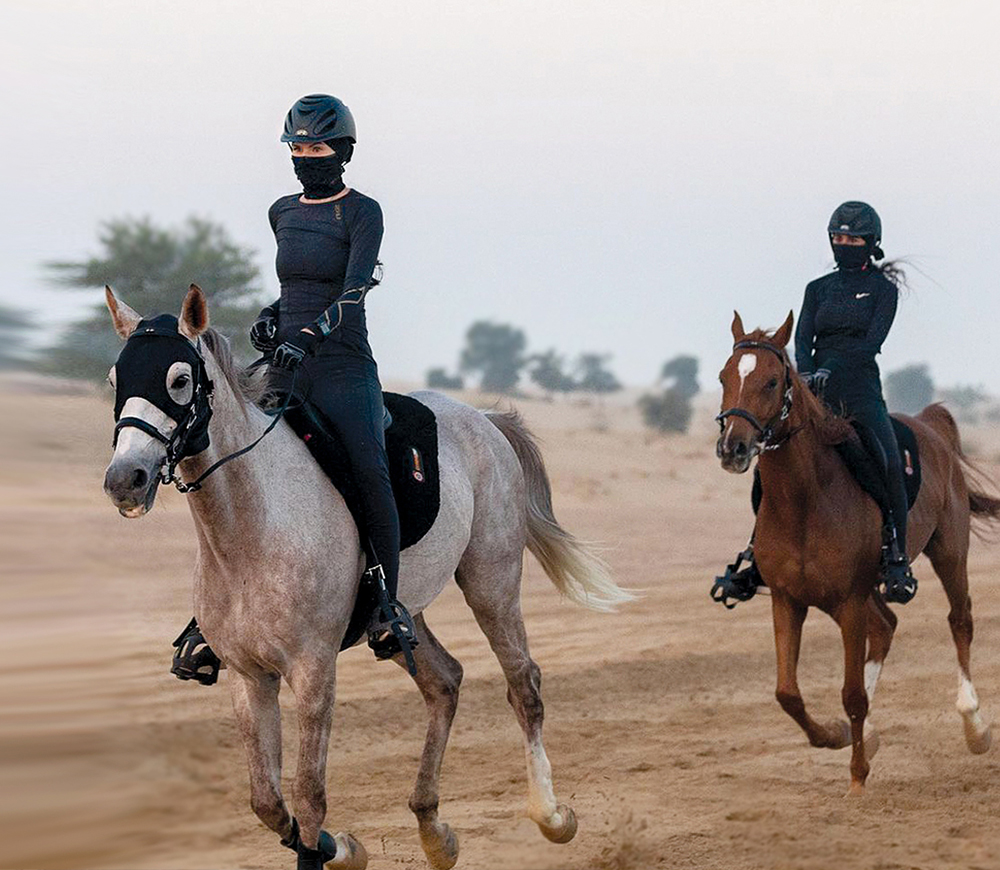 Horse riders in the dessert wearing NAROO mask